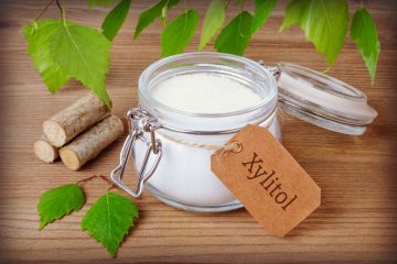 xylitol sweetener in jar with birch bark