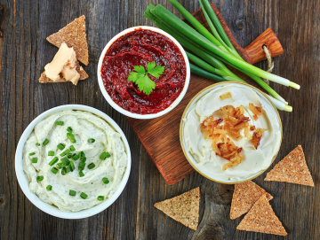 picture of three dips and chips on wood background