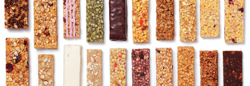 Different protein bars on white background