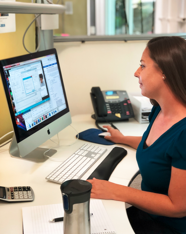 Employee looking at computer