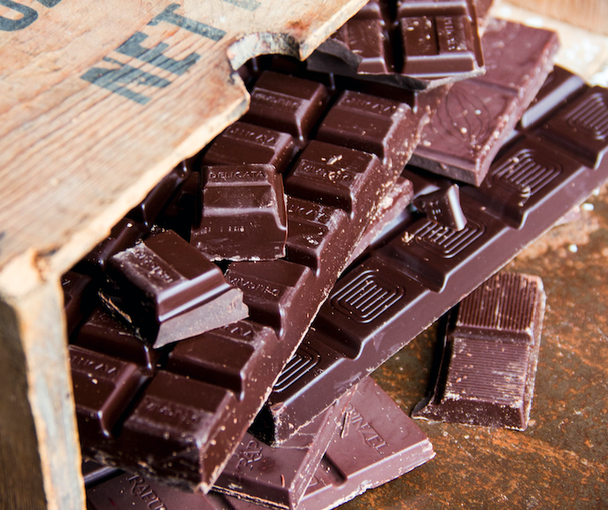 chocolate pieces in a wooden crate