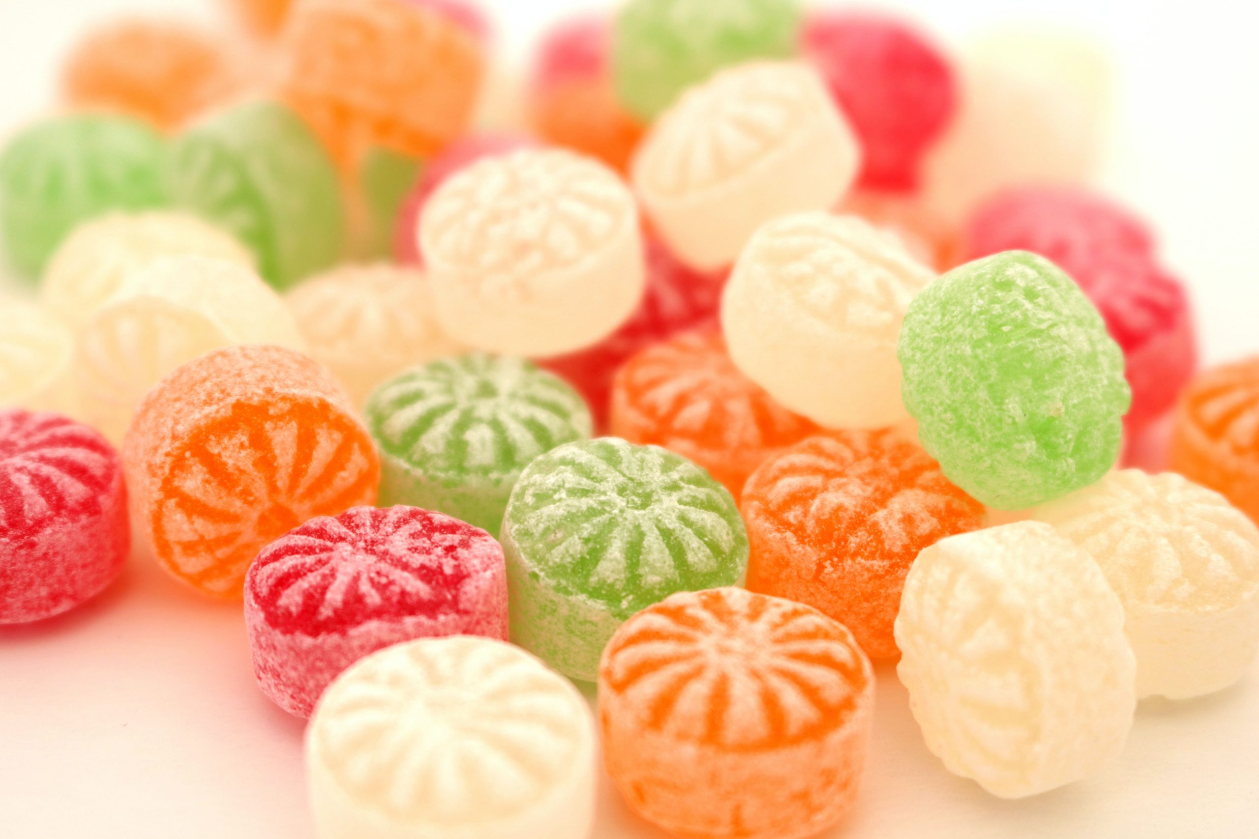 colorful hard candy on white background