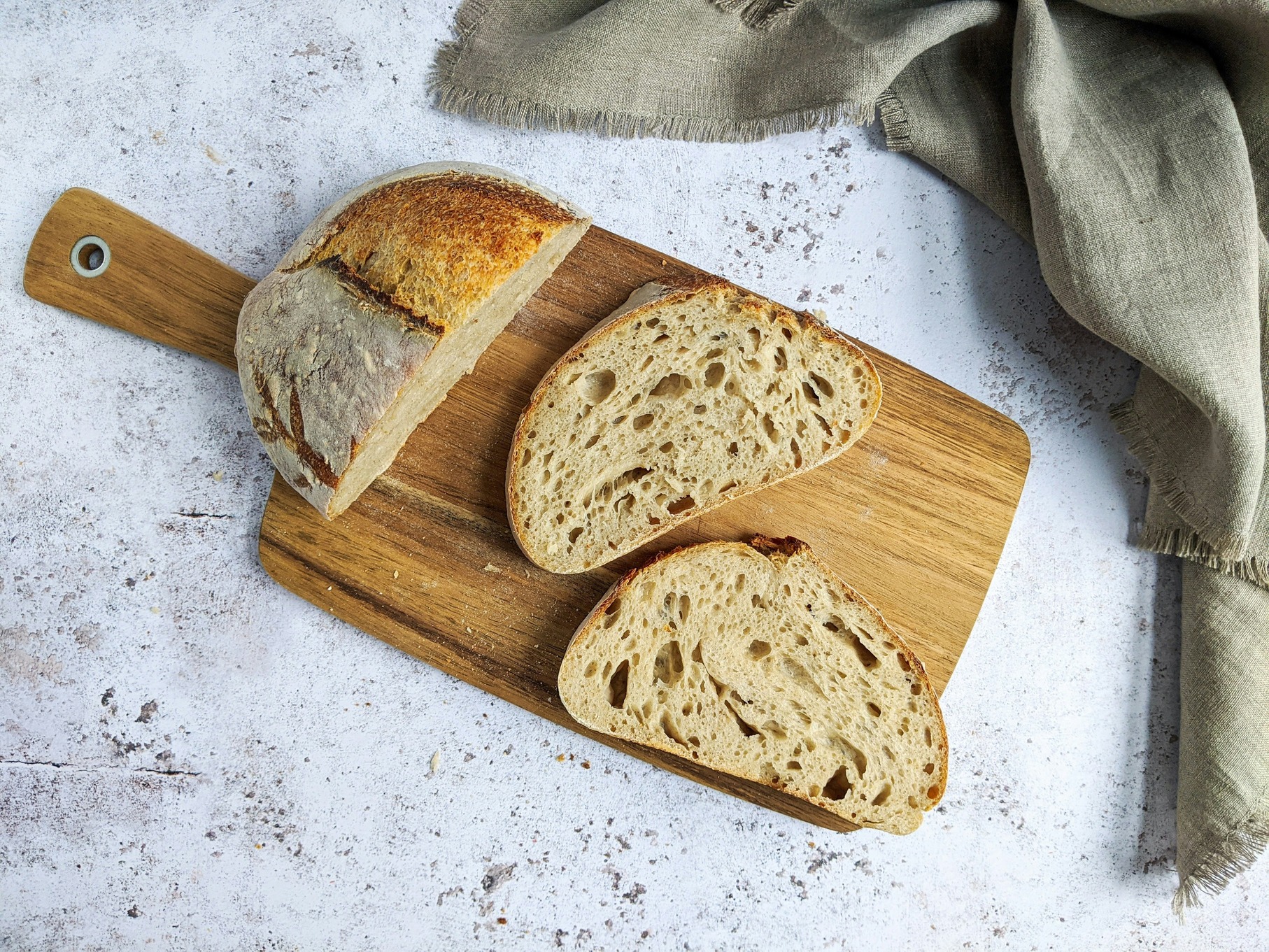 Slices of artisan bread on a cutting board