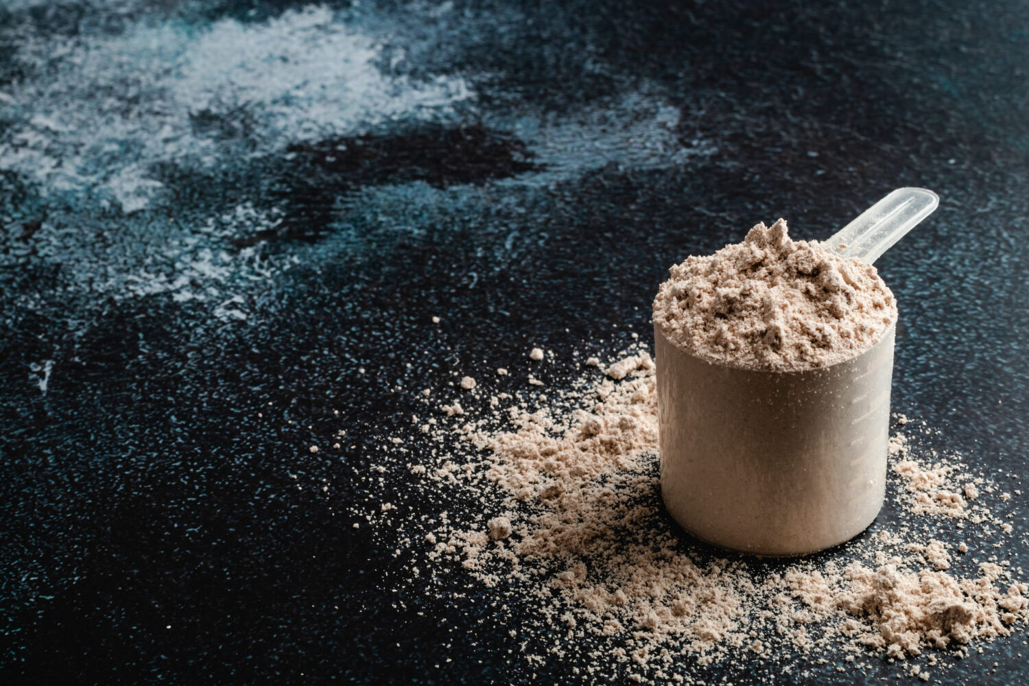 Scoop of vegan protein powder
